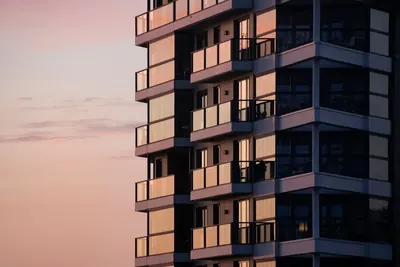 Modern apartment building with glass balconies