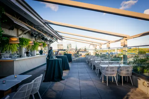 Rooftop terrace and bar set up before guests arrive at the ElevateOS event in Montreal