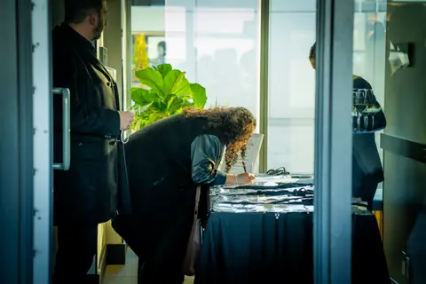 Guests checking in at the welcome table
