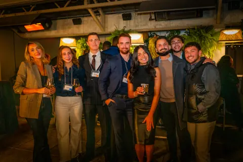 Group photo of attendees at the ElevateOS Montreal multifamily networking event
